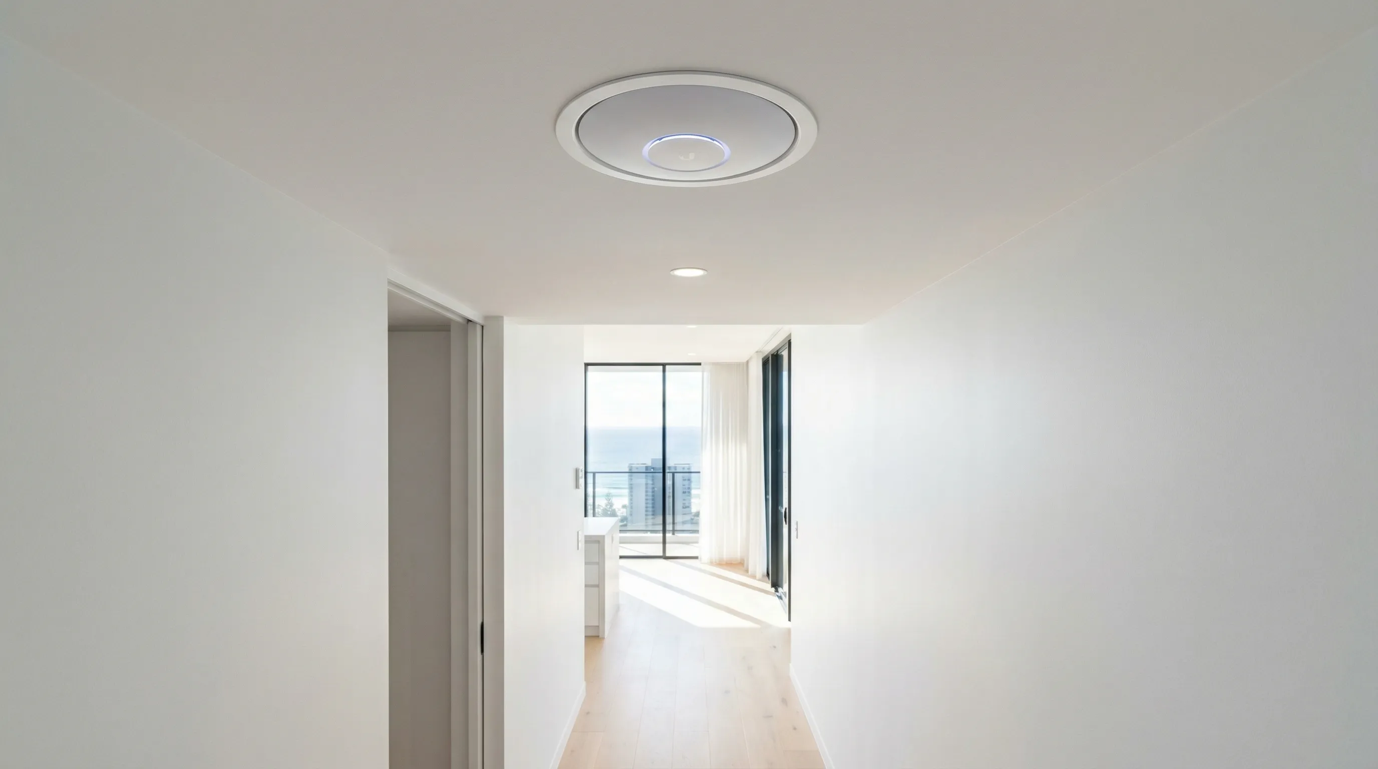 Professional Ubiquiti UniFi Access Point installation in a modern Gold Coast office environment